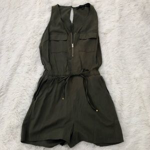 Size small romper with adjustable zipper.